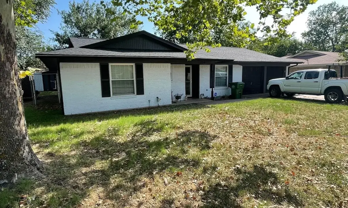 Professional roofing crew working on a residential roof in Glendale